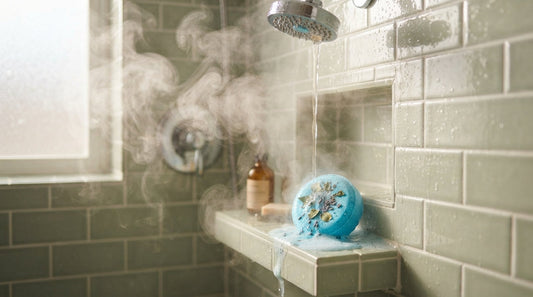 A shower steamer sitting on a shower ledge with warm steam rising