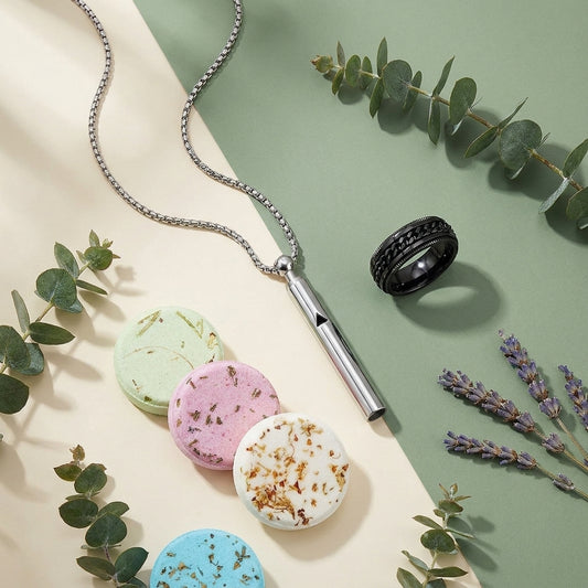 The Reset Bundle — breath pendant, spinner ring set, and shower steamers