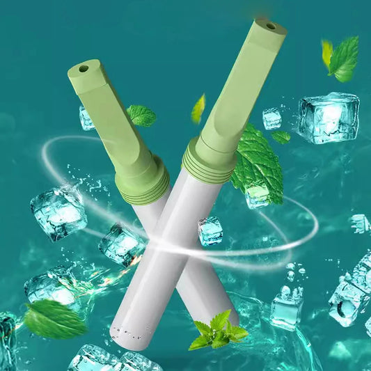 Two green and white Smokeless Air Inhalers crossed against a teal background with mint leaves and ice cubes